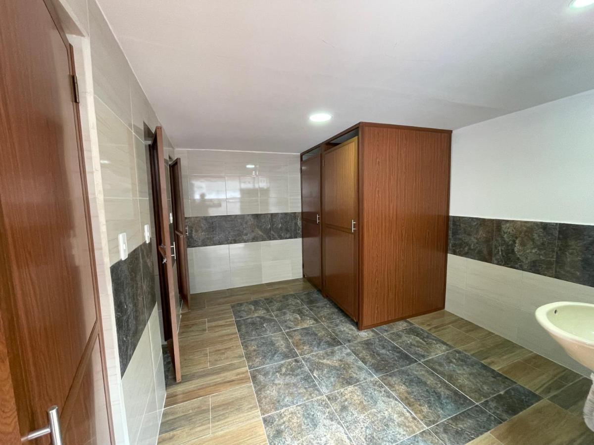 El Jardin Escondido Party Hostel بانيوس المظهر الخارجي الصورة