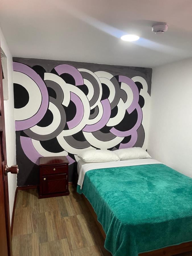 El Jardin Escondido Party Hostel بانيوس المظهر الخارجي الصورة